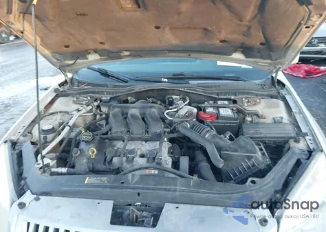 2006 Mercury Milan V6 z USA, uszkodzony, nr VIN 3MEFM07176R661285